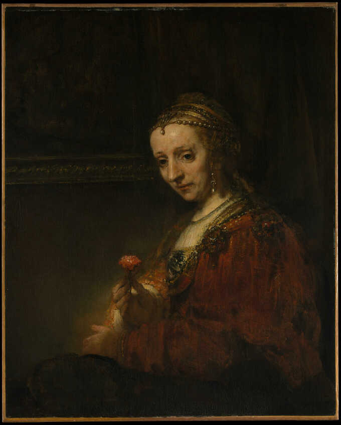 Rembrandt (Rembrandt van Rijn) : Femme avec une rose